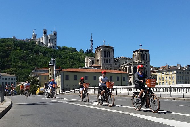 2h - Electric Bike Tour of Lyon with a Local Guide - Starting beside the Saône with Fourvière above you