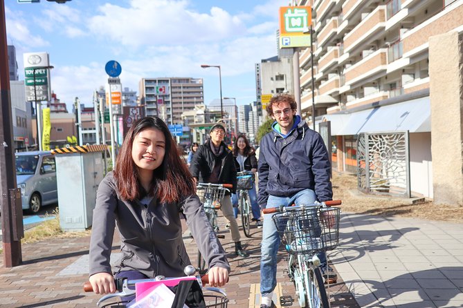 5-Hour Osaka Bike Tour to the Neighborhood of Osaka Castle - Riding through Osaka Castle Park
