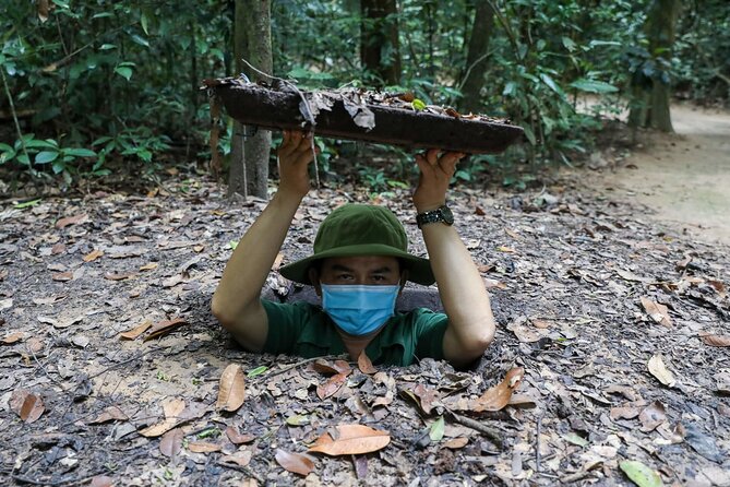 Adventure Cycling & Kayak Mekong-CuChi Tunnels Private Day Tour - Entering the Ben Dinh tunnel area