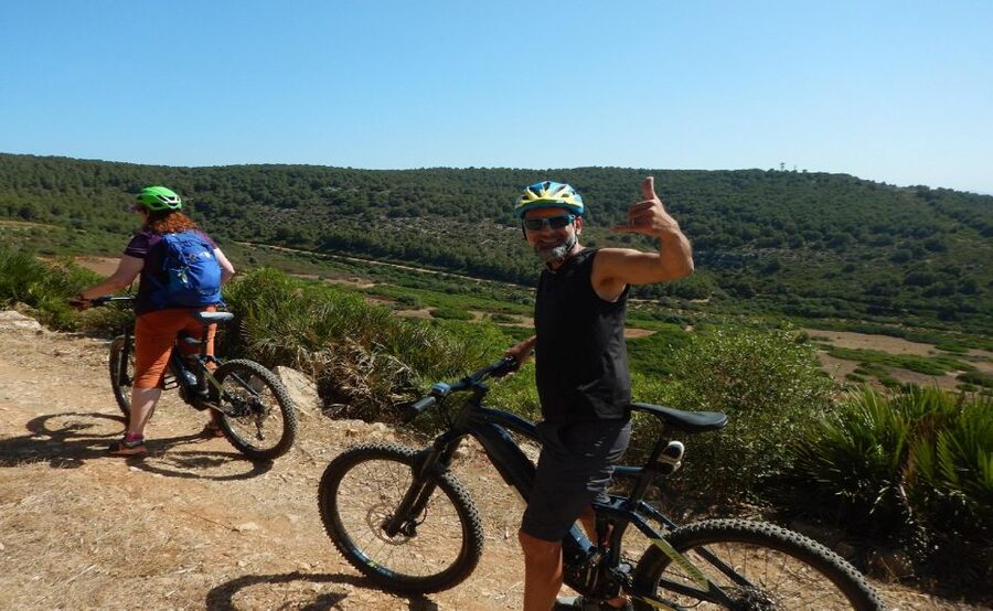 Alghero: E-bike tour inside the Natural Park of Porto Conte - Punta Giglio: bunkers, beaches, and wartime Sardinia