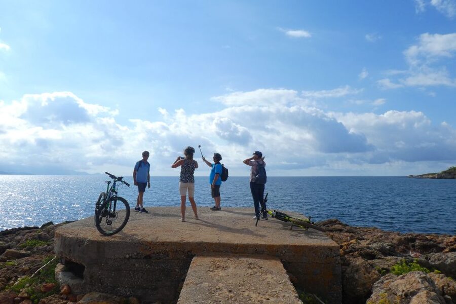 Alghero: Small Beaches E-Bike Tour with Aperitivo - Starting among vineyards, pines, and Mediterranean plants