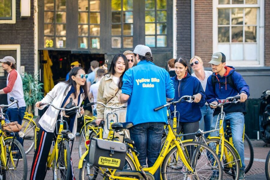 Amsterdam: 3h E-Bike Tour with break - Canals, courtyards, and the working harbor