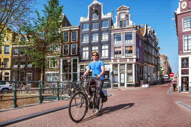 Amsterdam:: Bike Rental with Free Self-Guided Tour - Riding Amsterdam’s central sights at a human pace