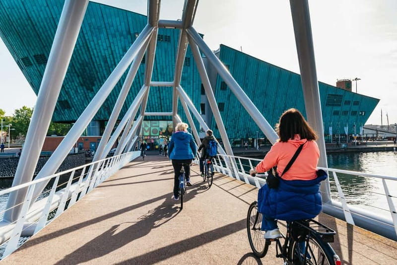 Amsterdam Bike Tour in Small Group + Optional Canal Cruise - Magere Brug and the city’s canal views