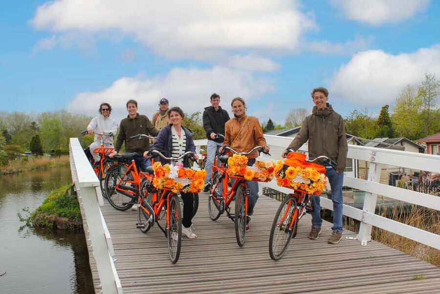 Amsterdam: Cheese Tasting, Windmill & Countryside Bike Tour - Crossing the IJ toward Durgerdam