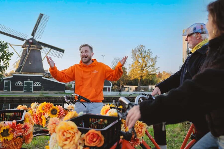 Amsterdam: Cheese Tasting, Windmill & Countryside Bike Tour - Canals, the Maritime Museum, and De Gooyer Windmill