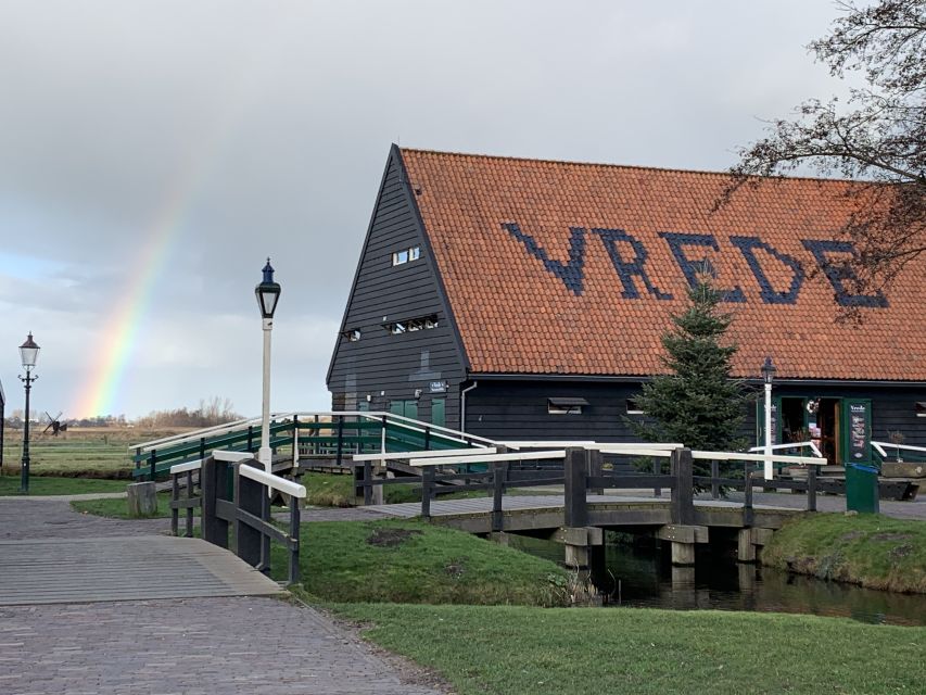 Amsterdam: Countryside Bike Tour and Zaanse Schans Windmills - Starting in Amsterdam and reaching Zaandam