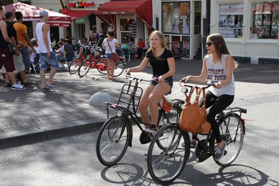 Amsterdam: Guided Sightseeing Bike Tour - Starting with Amsterdam’s canals and central sights
