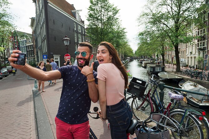 Amsterdam Highlights Bike Tour - Guided in EN/ES/DE/NL - Scharrebiersluis and the city’s water system