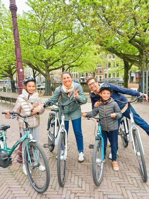 Amsterdam: Off the Beaten Path Bike Tour in French - Entrepotdok and Plantage: quieter Amsterdam by water