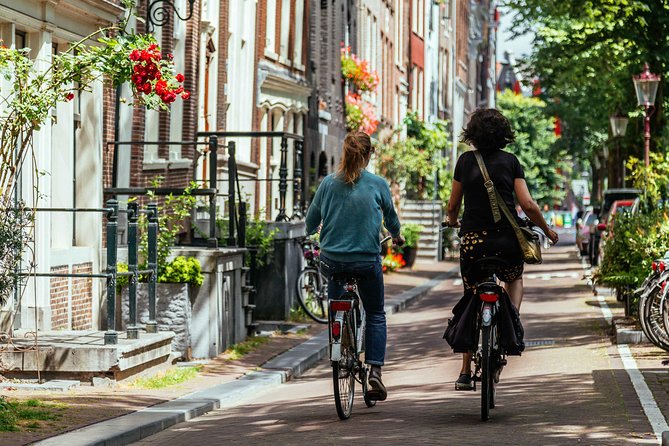 Amsterdam PRIVATE Bike Tour With Locals: Bike & Local Snack Included - A route that may leave the city center