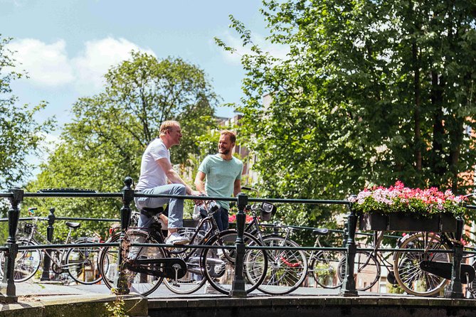Amsterdam PRIVATE Bike Tour With Locals: Bike & Local Snack Included - Meeting near Centraal Station and getting rolling