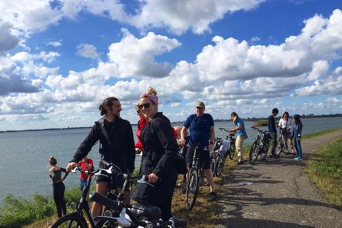 Amsterdam's Countryside Half-Day Bike Tour in Small Group - Ransdorp, war history, and a medieval-looking tower