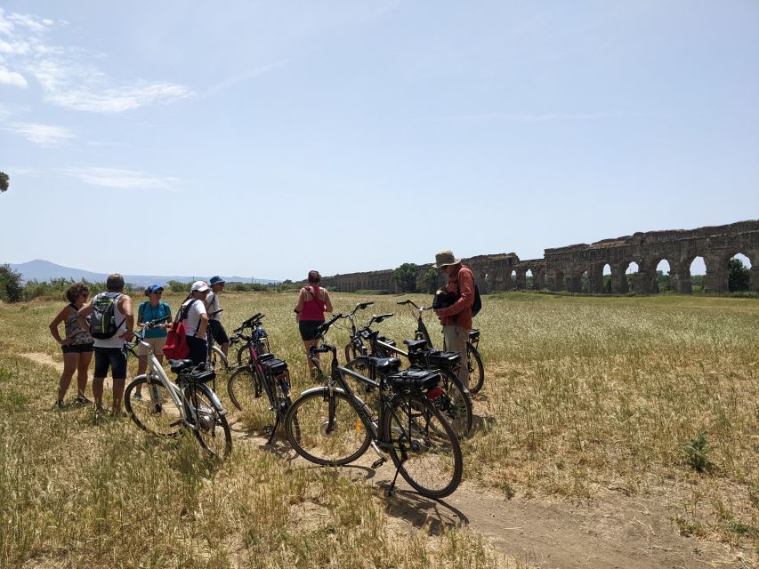 Appia Antica & Aqueducts e-Bike Tour - Official Provider - Passing the Villa dei Quintili and its nymphaeum
