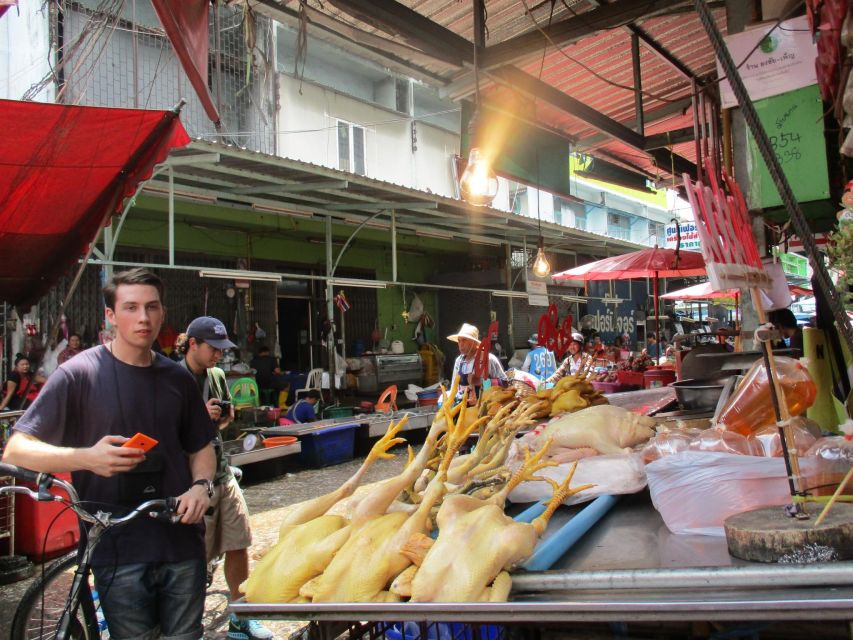 Bangkok Full-Day Bike Tour with Boat Transfer and Lunch - Communities beneath the highway
