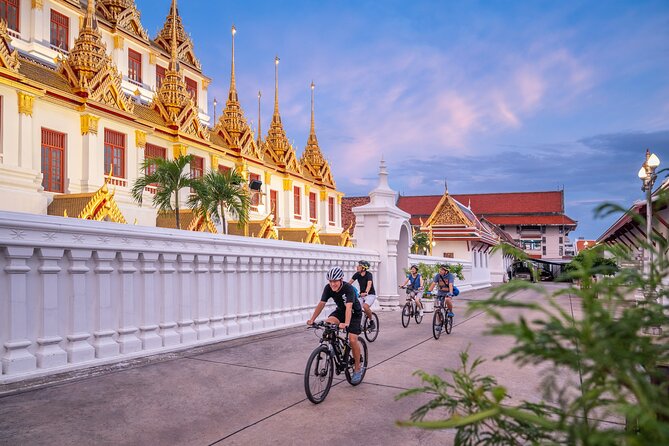 Bangkok: Night Bike Tour with Temples & Flower Market Visit - Rama VIII Bridge and the evening river crossing