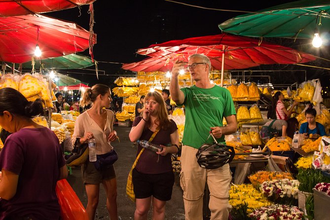 Bangkok: Night Bike Tour with Temples & Flower Market Visit - Pak Khlong Talat after dark
