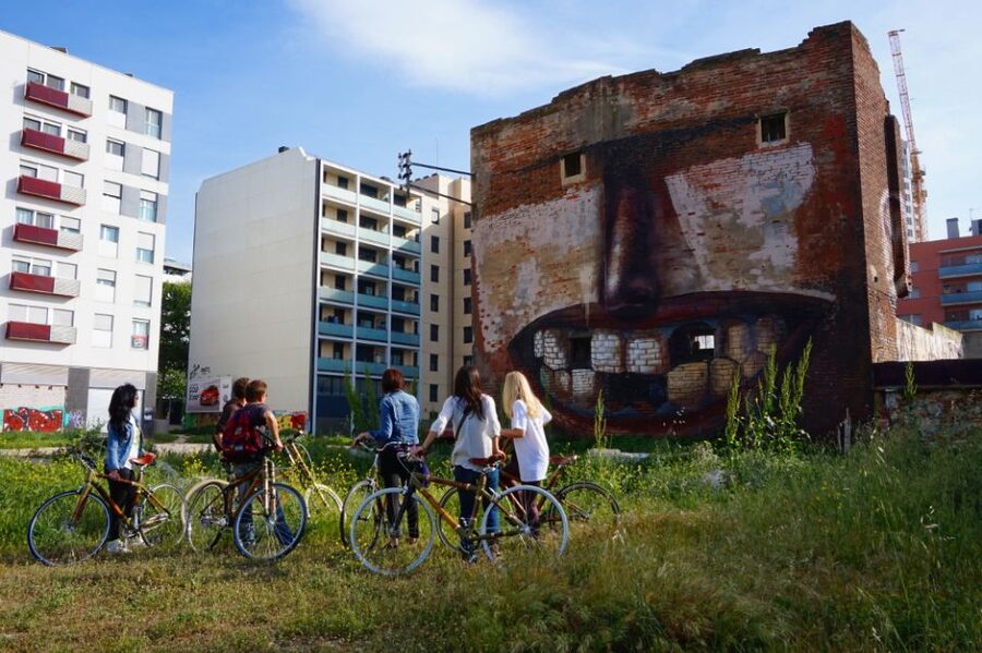 Barcelona: 3.5-Hour Street Art Tour by Bamboo Bike - Languages, guides, and the human side of the tour