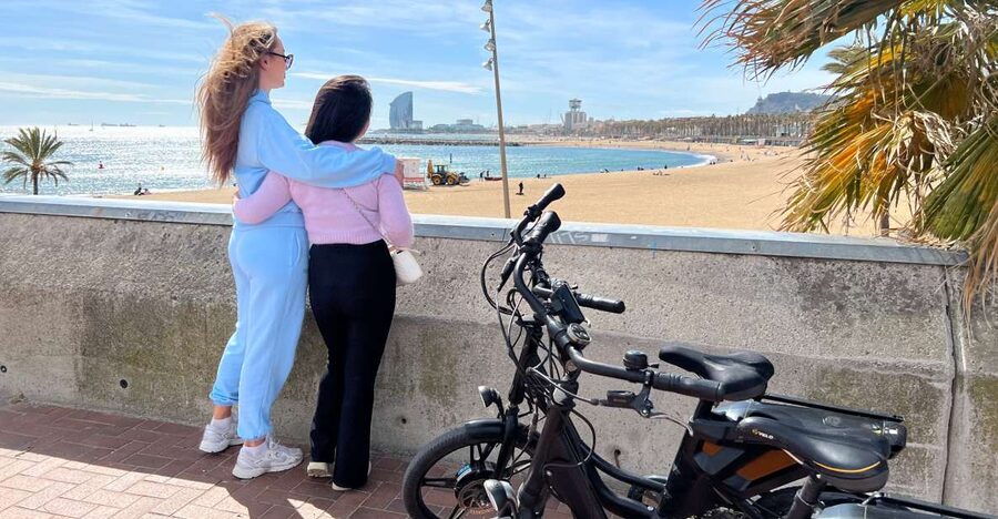 Barcelona: 3-Hour Montjuic Mountain E-Bike Guided Tour - Riding the promenade toward Montjuic