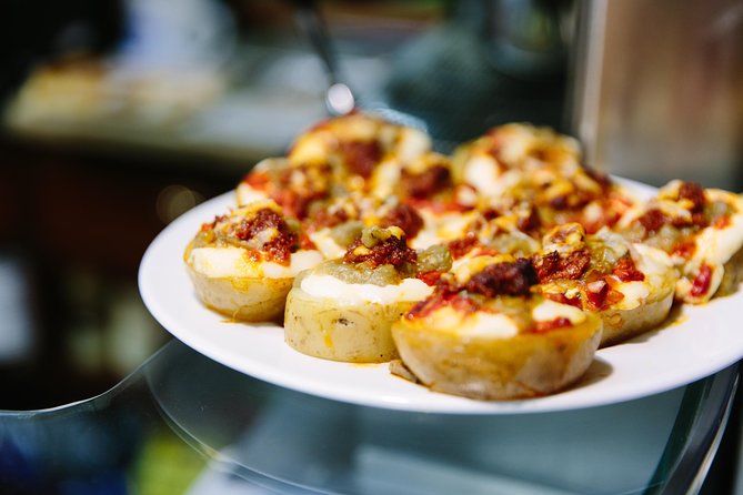 Barcelona Night Bike Tour with Local Tapas and Cava Stop - Casa Golferichs and Barcelona’s Modernisme story