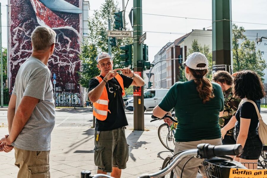 Berlin: Cold War & Berlin Wall History Guided Bike Tour - Checkpoint Charlie and the famous landmarks