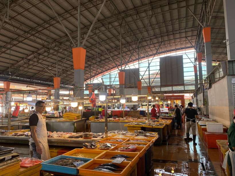 Best of Kuching: Heritage & Kampong Bike Tour - Street food, fruit, and a secret stop