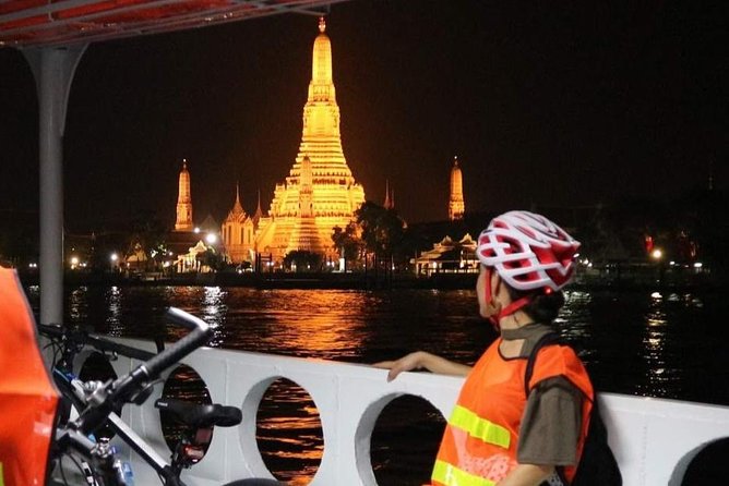 Bike Bangkok at Night with Thai Dinner - Wat Arun under lights