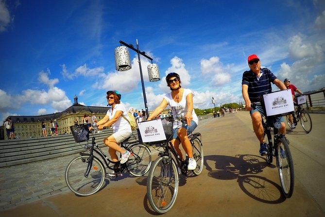 Bordeaux Essentials Sightseeing Bike Tour with a Local Guide - Palais Gallien and the city beyond the postcard