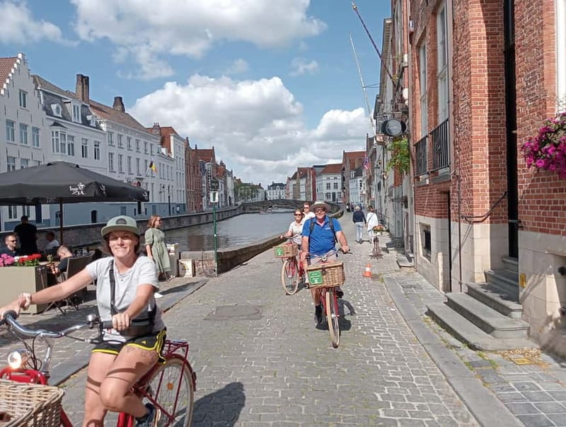 Bruges: Guided Retro Bike Tour of Highlights and Hidden Gems - Windmills, Sint-Anna, and the quieter side of Bruges
