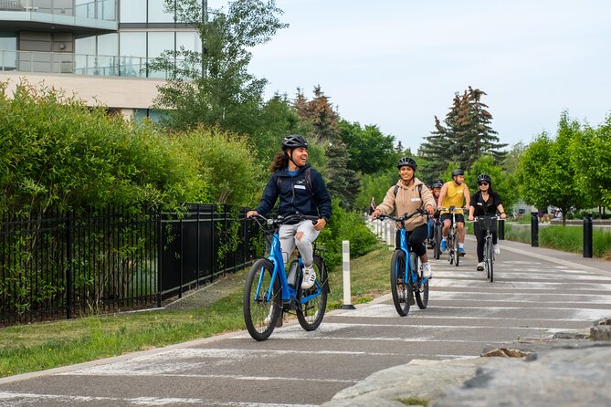 Calgary #1 Food Bike Tour: Taste Local And See The City By E-Bike - Following the Bow River toward Peace Bridge