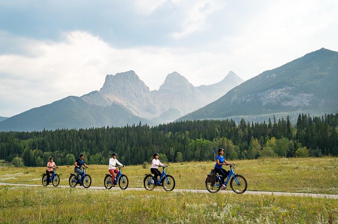 Canmore’s #1 Food Bike Tour: A Must Do Mountain Experience! - Riding through downtown Canmore