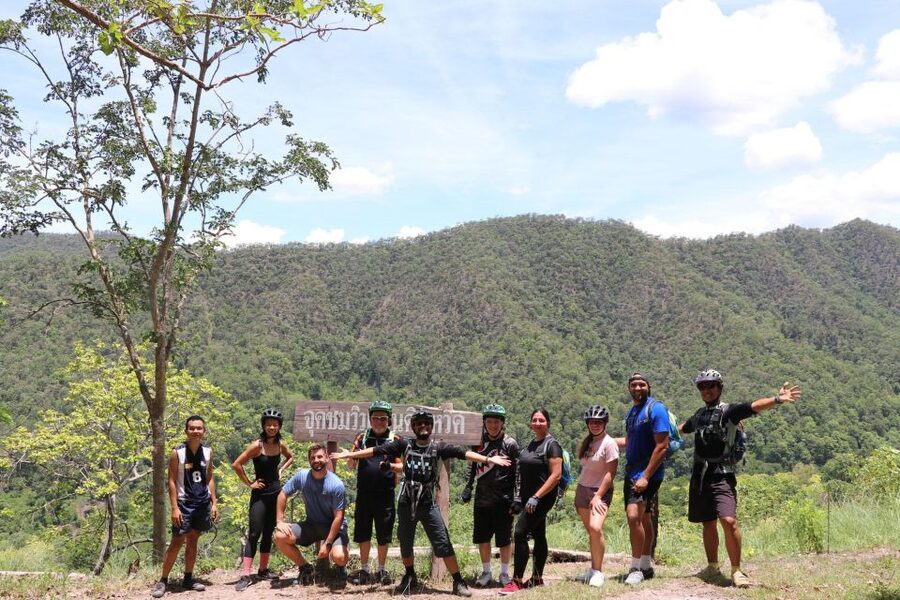 Chiang Mai: Boat Ride and Cycling Tour to Sticky Waterfall - Quiet roads, village life, and the first hill