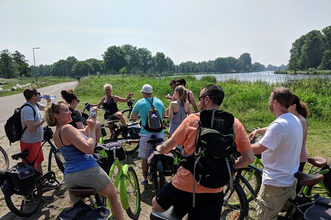 Countryside Bike Tour from Amsterdam: Cheese, Clogs & a Windmill - Leaving Amsterdam by bike and ferry