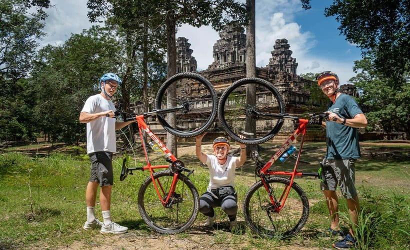 Cycle Angkor Backroad Bike Tour / E-Bike or Tuk Tuk - Riding into Angkor Thom through the ancient gate