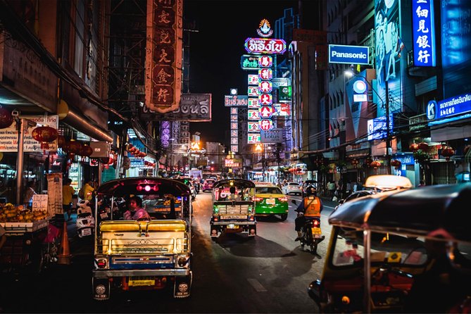 Discover Bangkok at Night 5-Hour Bike Tour with dinner - Crossing the Chao Phraya by local ferry