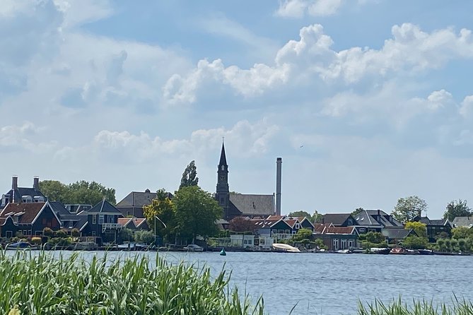 Escape Amsterdam: E-Bike to Zaanse Schans Windmills & Zaandam - Landsmeer: cows, sheep, and paths beyond car traffic