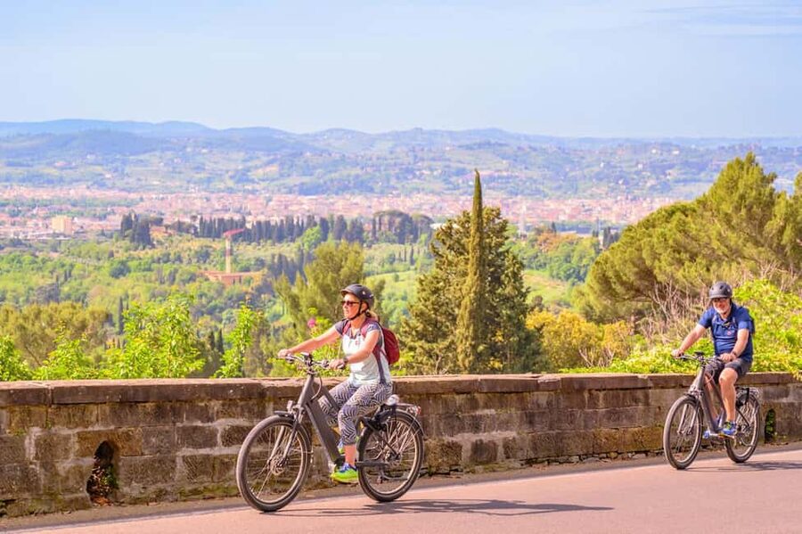 Fiesole E-Bike Tour with Olive Oil Tasting or Pool & Chill - Climbing to Fiesole by electric bike