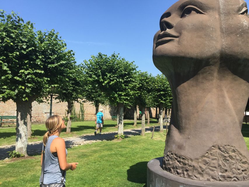 From Bruges: Family-Friendly Countryside Guided Bike Tour - Canals, poplar trees, and Belgian cows