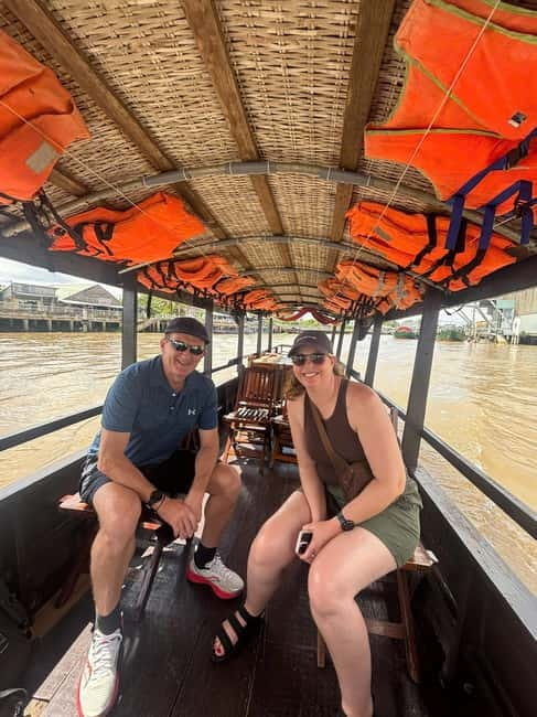 From Ho Chi Minh: Cai Be Boat & Bike Mekong Delta Experience - The sampan through coconut-shaded canals
