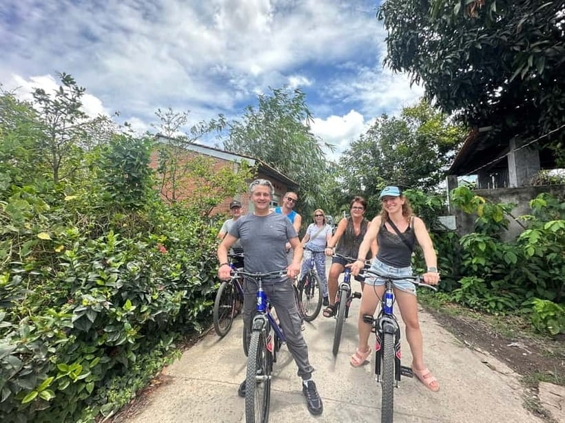 From Ho Chi Minh: Cai Be Boat & Bike Mekong Delta Experience - Lunch in Cai Be, with a clear local focus