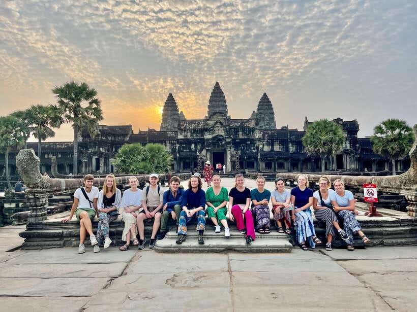 From Siem Reap: Angkor Wat Sunrise and Temples E-Bike Tour - Guides, photographs, and the human side of the day