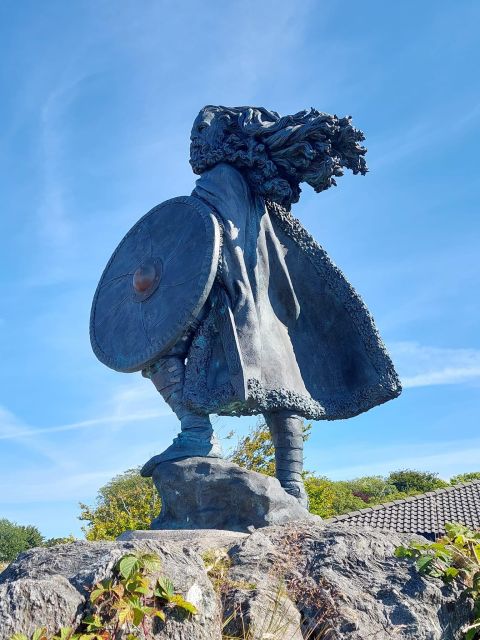 Guided E-Bike Tour in Haugesund: city, vikings, Rising Tides - Haugesund town centre, Town Hall, and harbour views