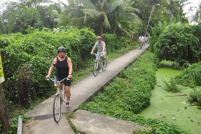 Half-Day Bangkok Bike Tour Including Lunch - Taling Chan Floating Market on weekends
