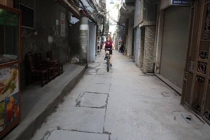 Half-Day Bicycle Tour Combine City & Countryside + Train Street - Crossing Long Bien Bridge, Hanoi’s great railway landmark
