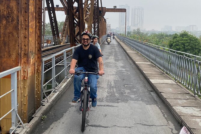 Hanoi City Bike Tour through Banana Island & Food Tasting - Crossing Long Bien Bridge