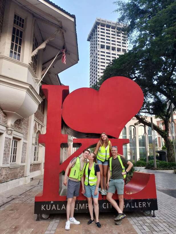 Hidden Kuala Lumpur: 4-Hour Bike Tour - Traditional work, small shops, and local food