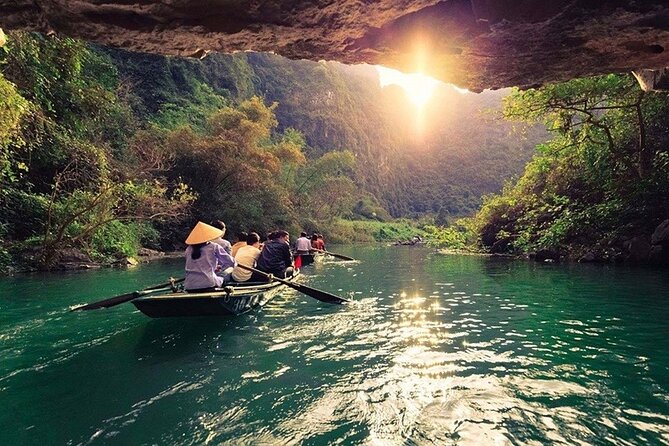Hoa Lu - Tam Coc - Ninh Binh Day Tour: Biking, Visit Local Family - Tam Coc by small boat and limestone caves