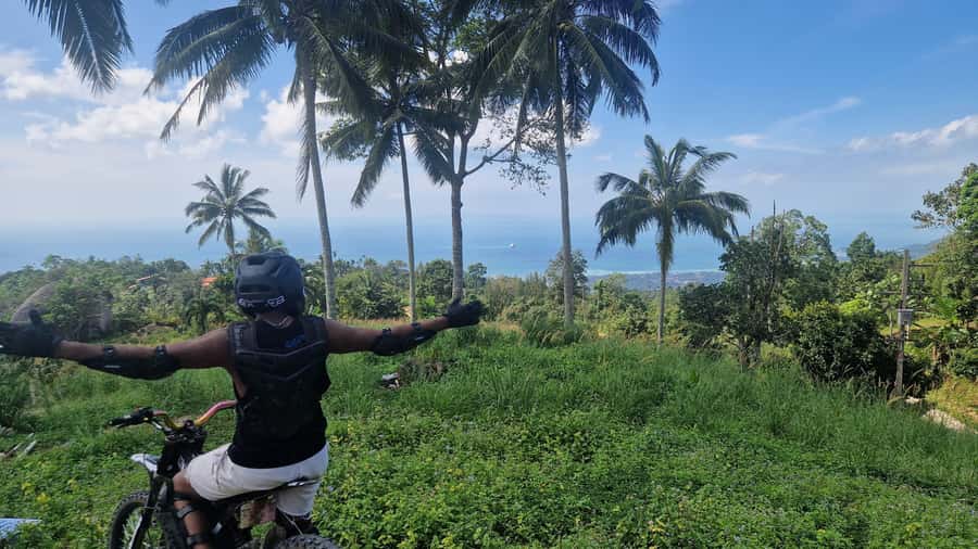 Koh Samui: Surron Electric Dirt Bike Jungle Adventure 2H - A drink, coconut, and a view of the Gulf