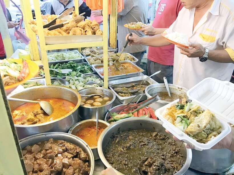 Kuala Lumpur: Evening Food Tour by Bike - Eating through Kuala Lumpur’s neighborhood streets