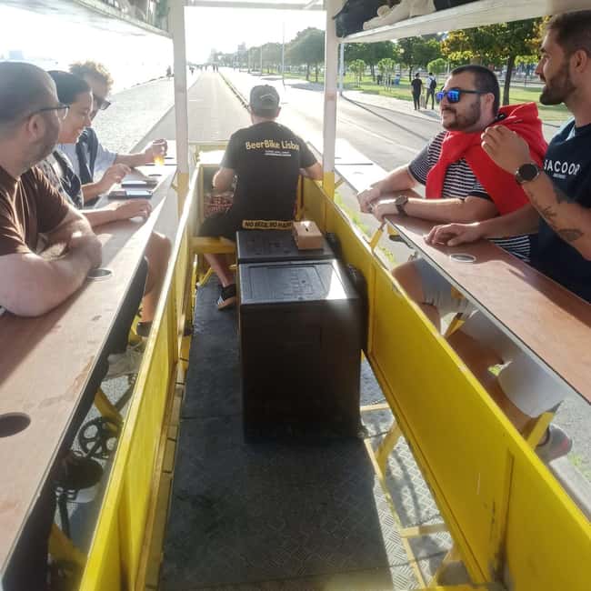 Lisbon: 1-Hour Beer, Sangria or Wine Bike Sightseeing Tour - 25 de Abril Bridge brings the strongest photo stop